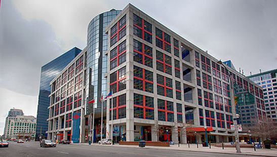 The photo shows the exterior of the 13 storey Canadian Broadcasting Centre, located in Toronto, Ontario. It is the broadcast headquarters and master control point for the Canadian Broadcasting Corporation's English-language television and radio services.