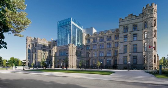 Photo of the Canadian Museum of Nature in Ottawa, ON. The 4 storey heritage ‘Castle-style’ building has a new glass tower at the front as the new accessible entry.